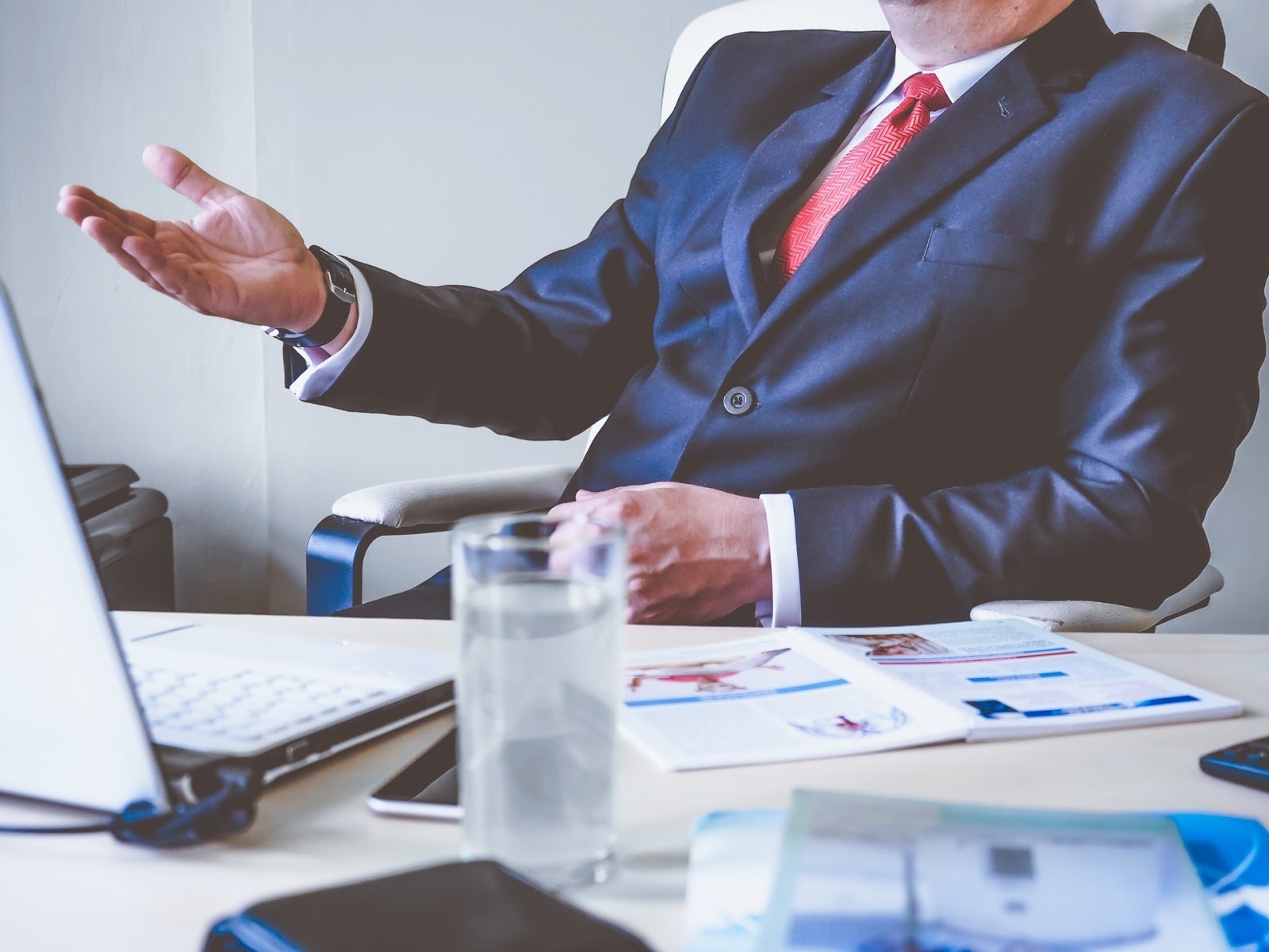suited man in office desk